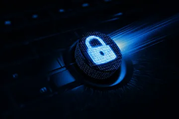 A laptop glowing with a bright login prompt in a minimalistic setup, symbolizing the protected access system at SOUL777BET.